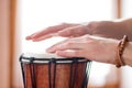 Playing the drum. Cut out of maleÃ¢â¬â¢s hands which are playing in the rhythm Royalty Free Stock Photo